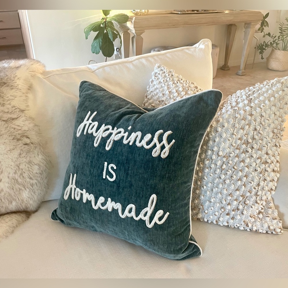 Two green velvet throw pillows.